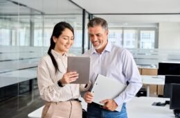 Two,Happy,Professional,Business,People,Team,Asian,Woman,And,Latin