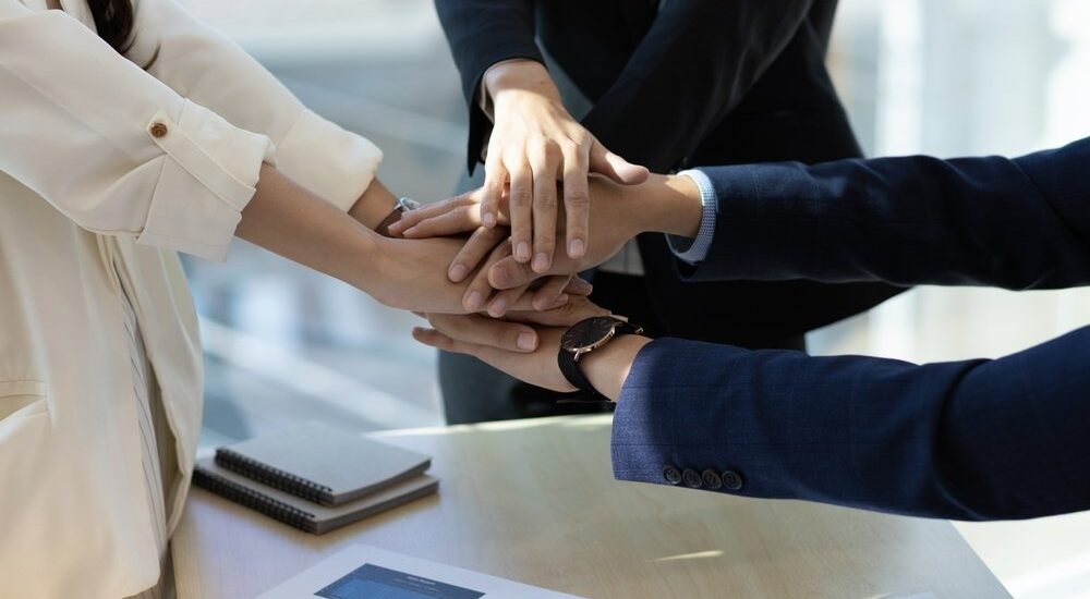 Unity,And,Cooperation,Of,People,In,Business,Enterprise.